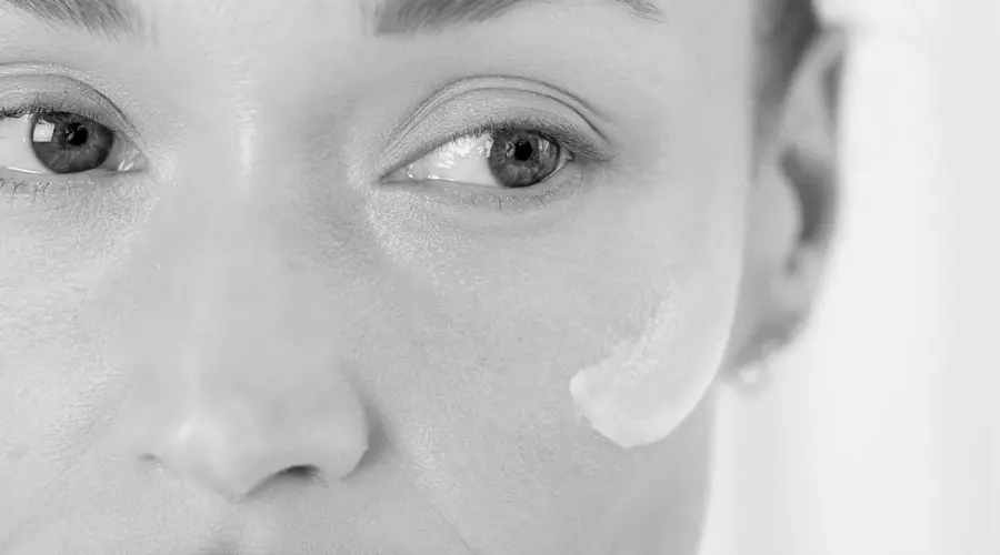 Revision skincare on cheek.