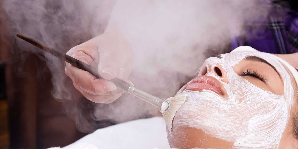 Woman getting a moisturizing facial.